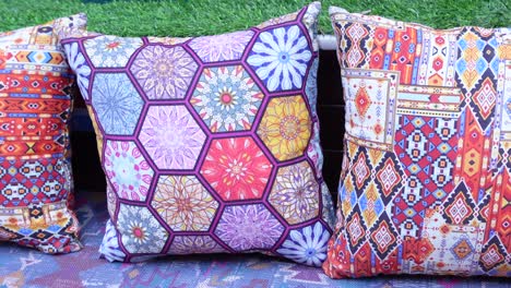 colorful geometric pillows with tribal patterns