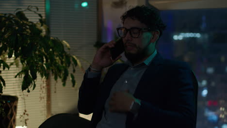 businessman on phone at night