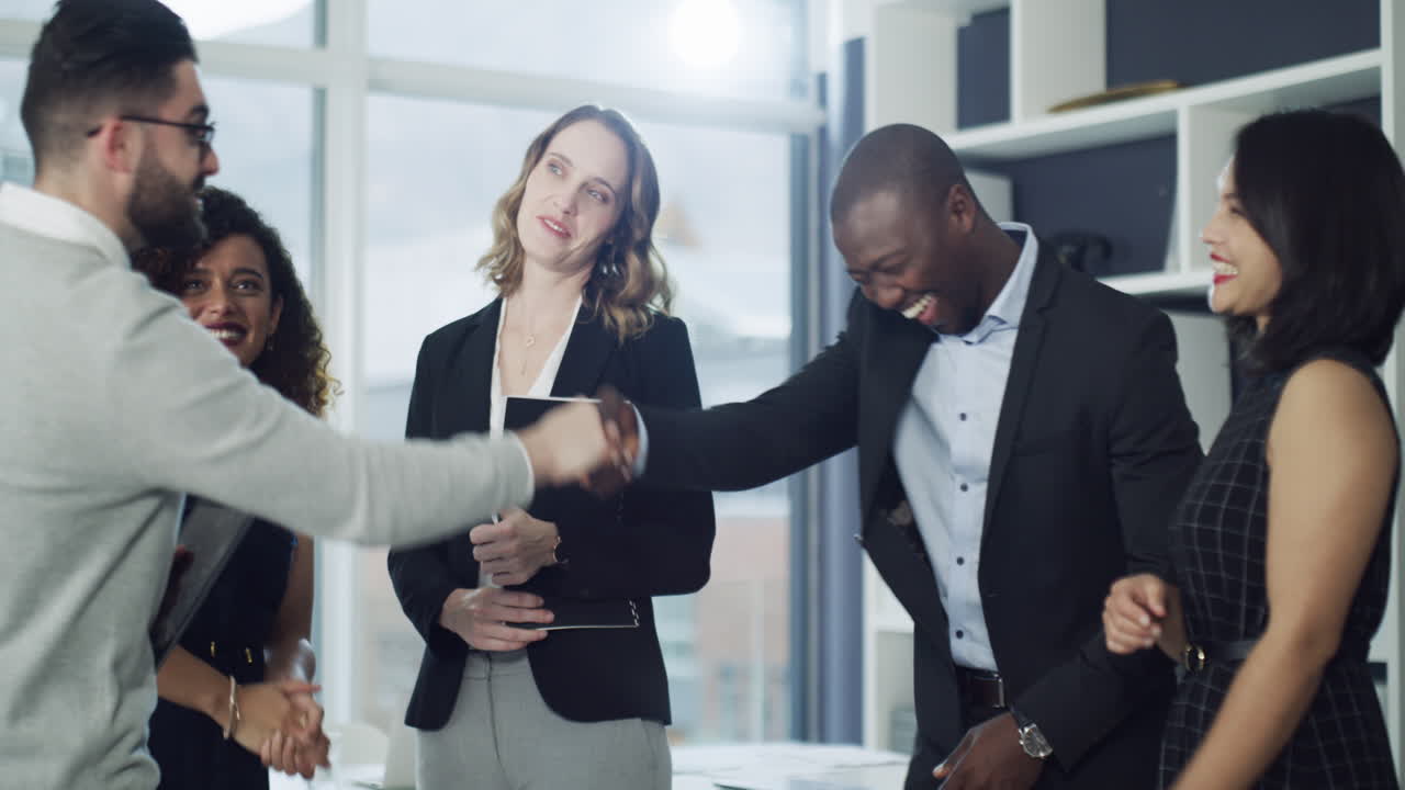 a group of businesspeople shaking hands