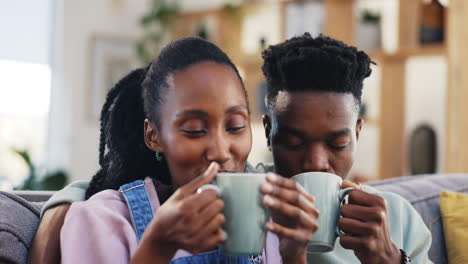 Coffee,-toast-and-a-happy-black-couple-on-a-sofa
