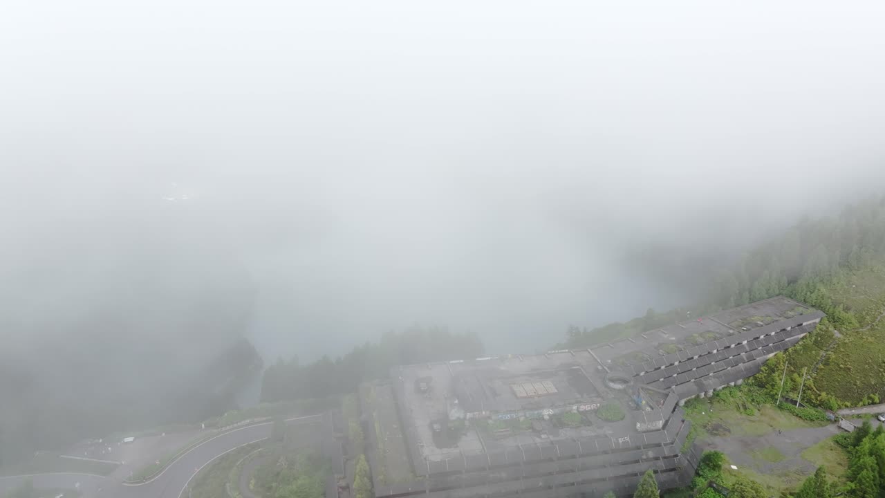 Aerial view of Ru&iacute;nas do Monte Palace Hotel during a cloudy day - drone shot