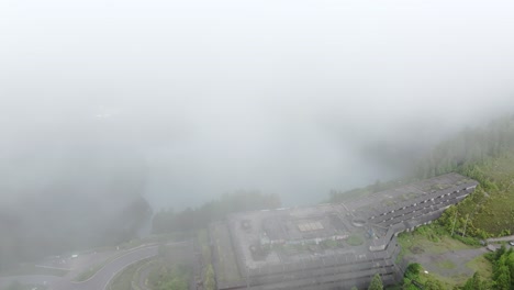 Aerial view of Ru&iacute;nas do Monte Palace Hotel during a cloudy day - drone shot