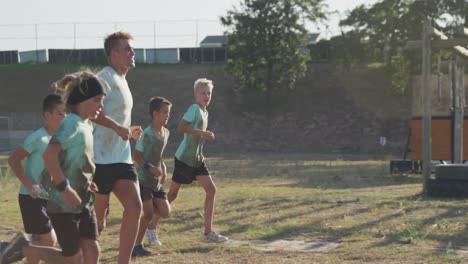 Group-of-Caucasian-children-training-at-boot-camp-