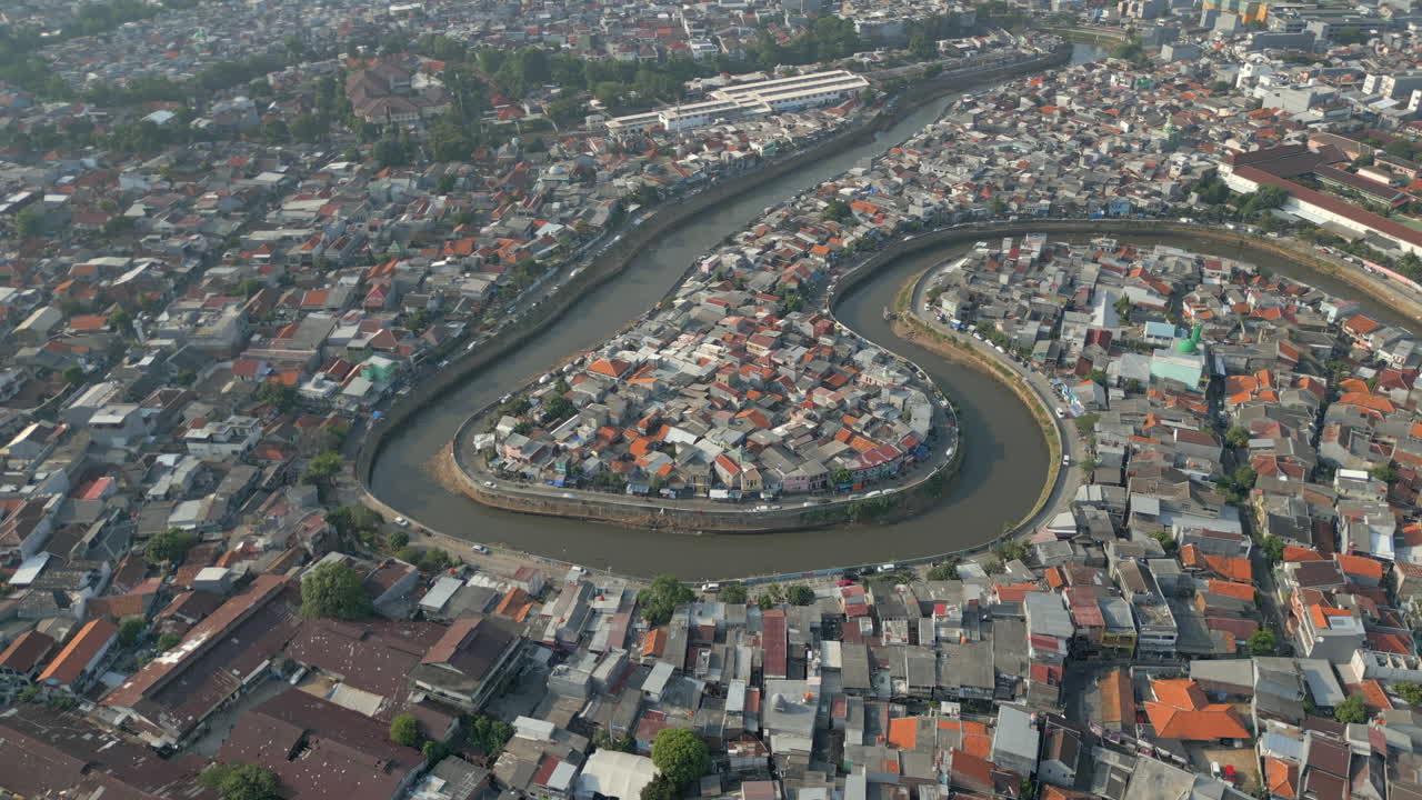Canal Snakes Around Crowded Slum Neighborhoods In Tebet Jakarta Drone Rotate 4K 60FPS