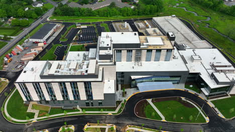 modern american hospital building, new construction aerial reveal