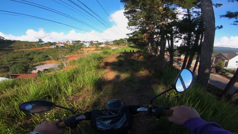 motocross biker pov drive off-road through pine trees