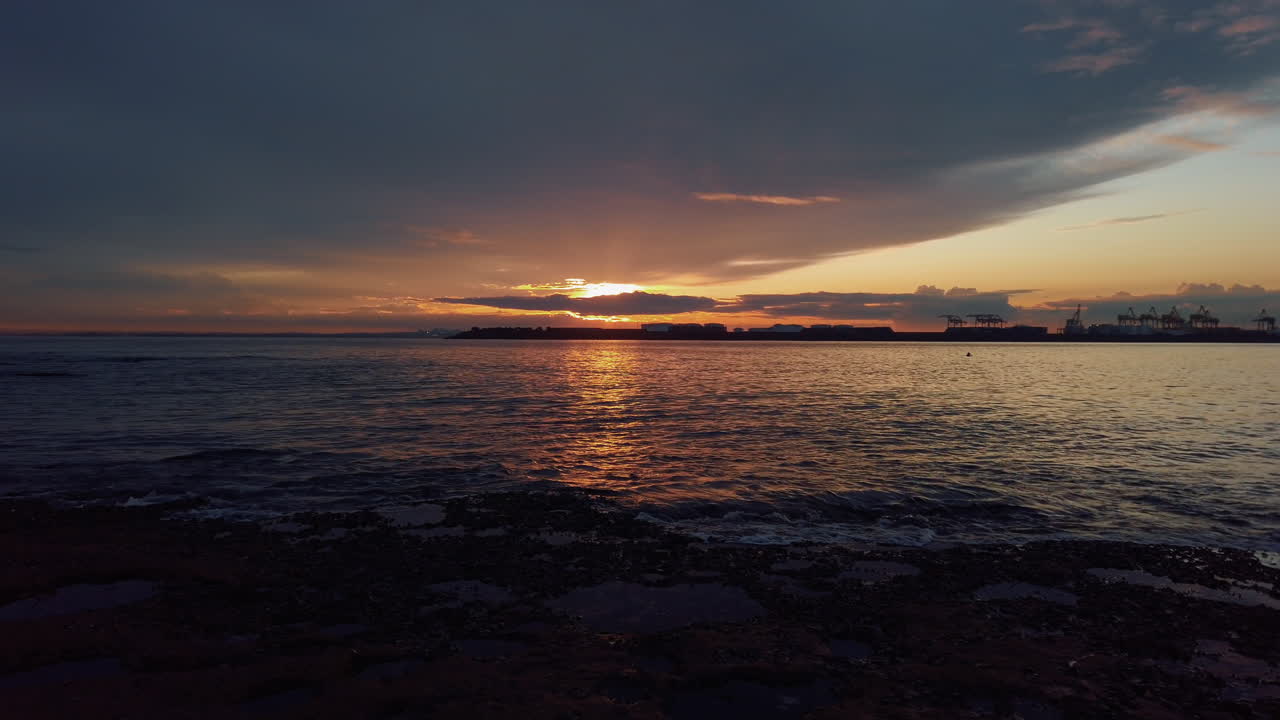 Final moments of sun on horizon creating magical moment with stunning light