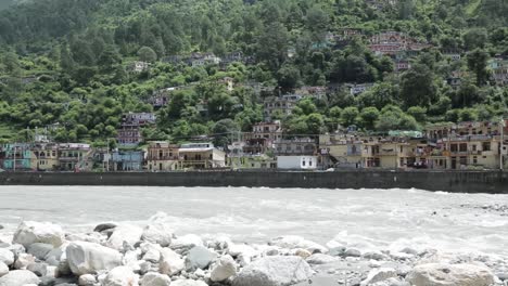 himalaya mountainous river ganges flowing through himalaya villages - cities in uttarakhand, india