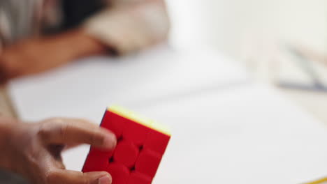 child solving rubik's cube