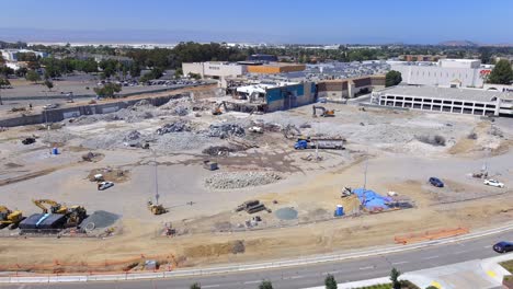 Zoom-out-with-drone-of-large-demolition-area-for-renovation-of-old-building