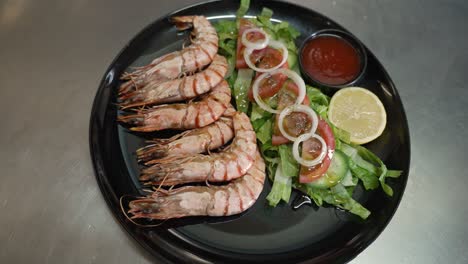 savoring flavors of freshly grilled prawns with a vibrant salad in a seaside setting