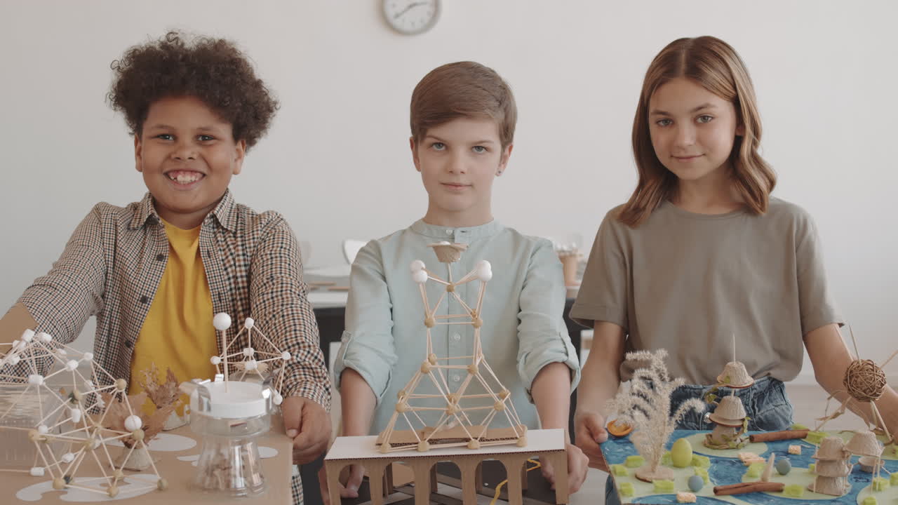 Diverse Children Posing with Craft Projects