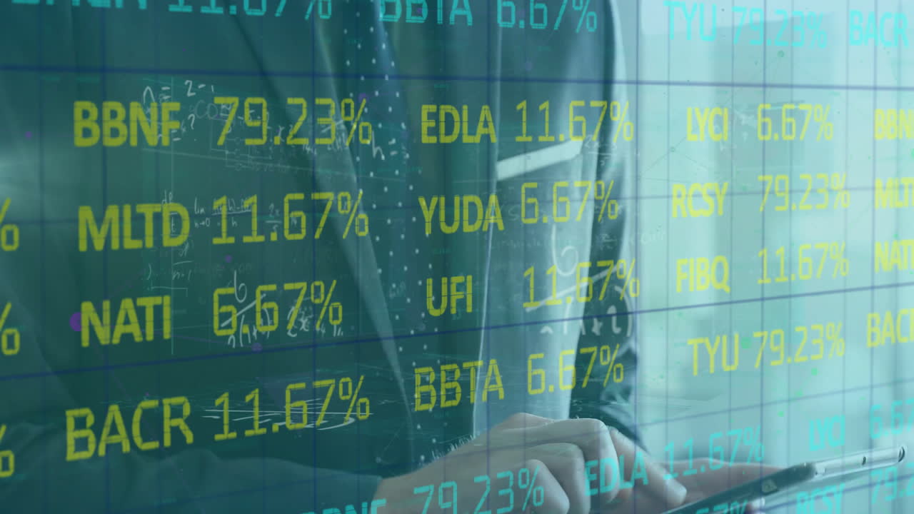 Animation of financial data processing over caucasian businessman using tablet in office