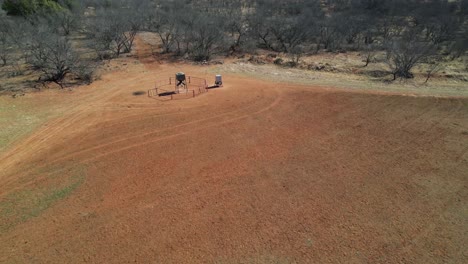 Aerial-video-approaching-a-deer-feeder