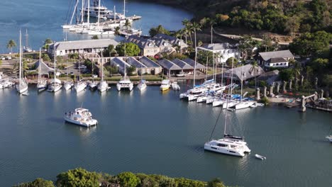 aerial view of a caribbean marina with yachts and sailboats