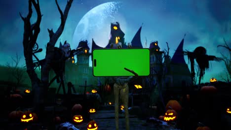 skeleton hand rising up smartphone with green screen, halloween haunted house with bats, and pumpkins under scary moon cinematic video animation background