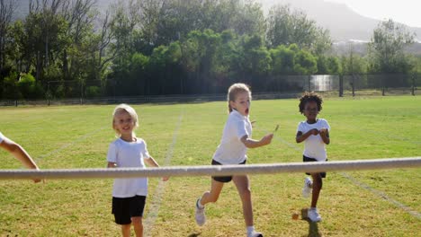 children playing lemon and spoon race