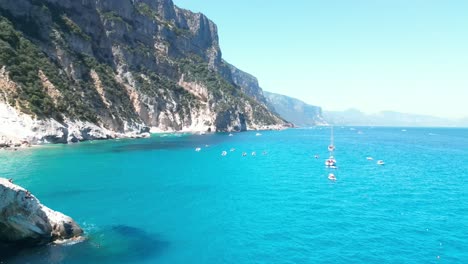 Nautical-tourism-and-boating-along-italian-coastline-in-Cala-Goloritze,-Aerial