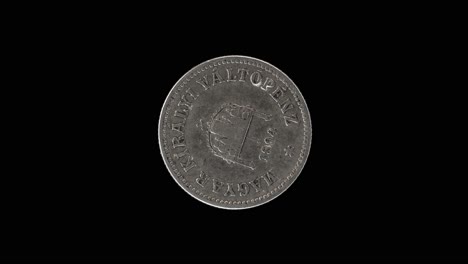 hungary 10 fillér 1894 obverse with crown of st. stephen, macro loop on black background