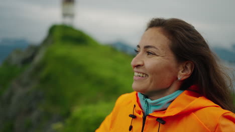 smiling woman on a coastline