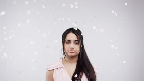 woman in pink dress with confetti