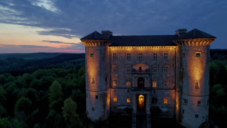 illuminated castle at sunset