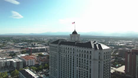 incredible shoot approaching building and united states flag at the top