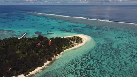 drone shot of managaha island and mariana's trench