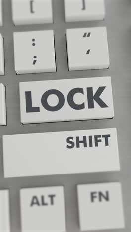 presión del botón de bloqueo en el teclado vídeo vertical