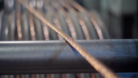 close-up copper wire comes in rolls for the drawing process at the cable factory.