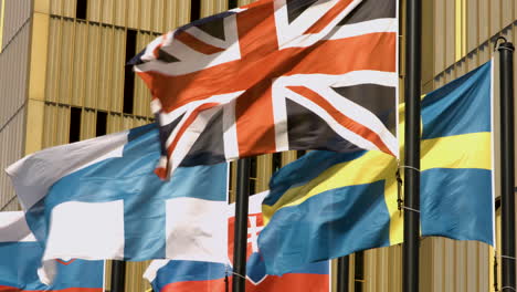 european country flags blowing in the wind