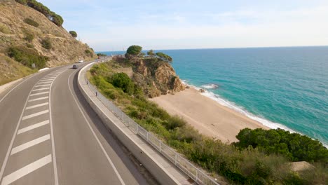 road overlooking the sea, mediterranean calella, barcelona green vegetation, route