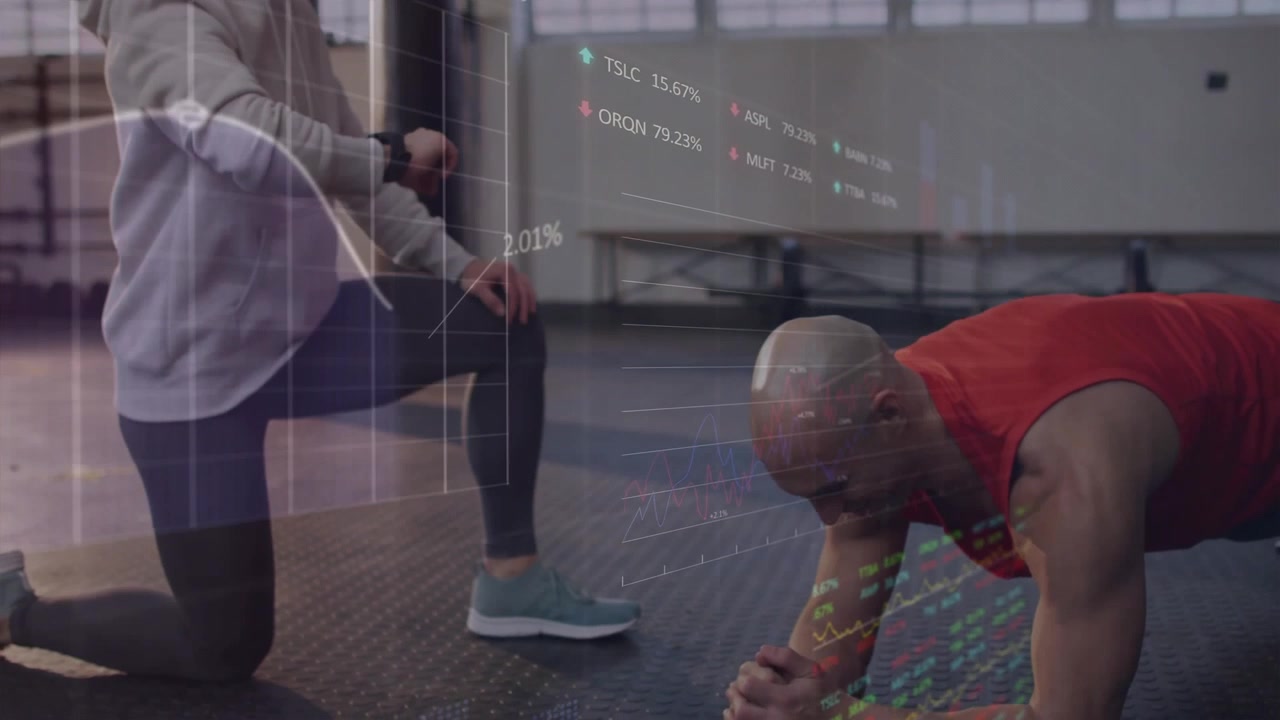 Fitness trainer tapping smartwatch guiding client holding plank while grid building metrics chart