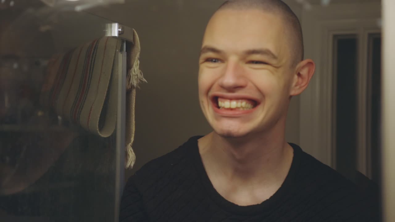 Young Man Gargling While Standing In Front Of The Mirror - Closeup Shot