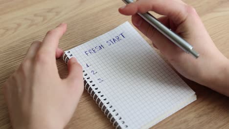 fresh start goals on a notepad