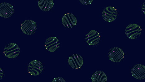 spiraling pattern of green and blue circles on dark blue background