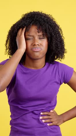 young african american woman expressing pain and discomfort