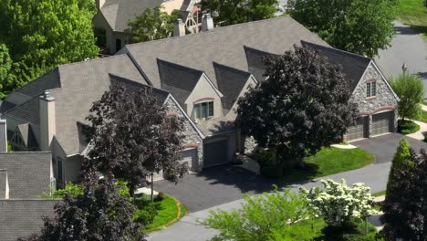 panoramic view of a beautiful row of townhomes on a quiet street in a private community