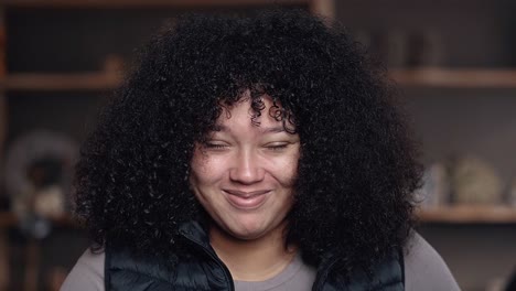 Beautiful-black-women-with-curly-afro-laughing-portrait