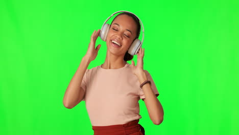 Dancing,-headphones-and-woman-on-green-screen
