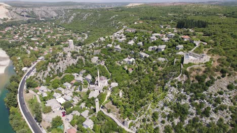 aerial flyover view of počitelj village, bosnia and herzegovina