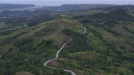 Reveal-shot-of-Lapale-Hills-Sumba-island-during-sunset,-aerial