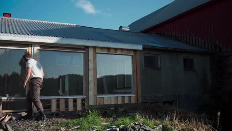 a man is constructing a greenhouse in indre fosen, trondelag county, norway - timelapse