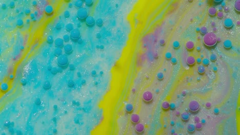 Macro-structure-of-multicolored-water-paint-oil-bubbles-movement,-bright-colorful-acrylic-painting