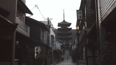 Slide-shot-of-a-beautiful-temple-during-sunrise-in-Kyoto,-Japan-4K-slow-motion