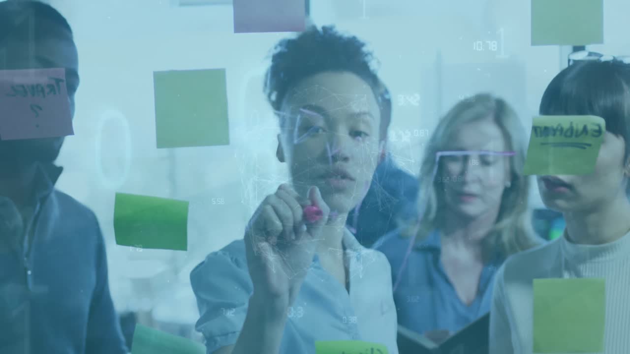 Animation of data processing over diverse business people working at office