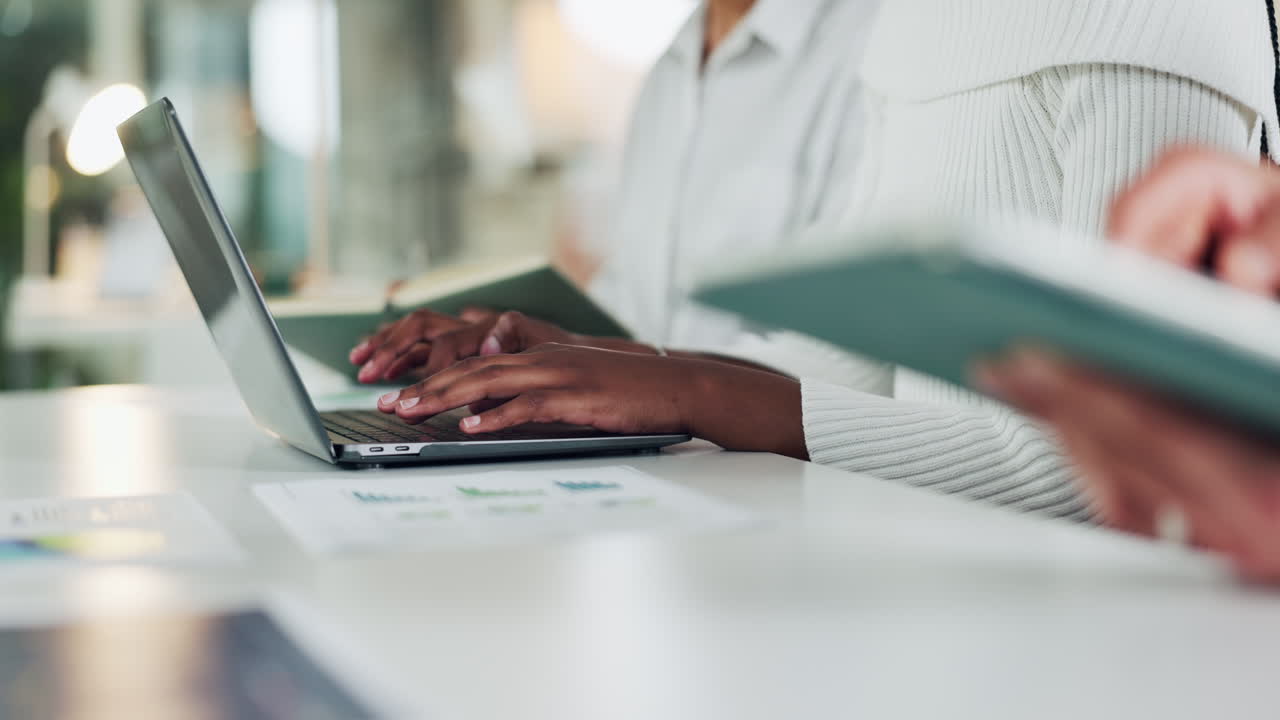 Working on Laptop and Tablet in Office