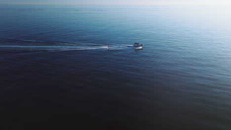 Aerial-drone-view-of-a-man-water-skiing-on-the-Mediterranean-Sea