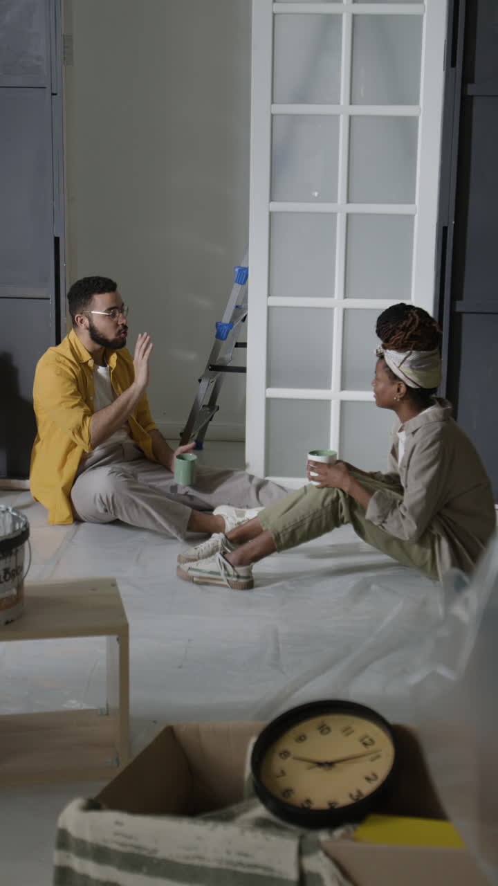 Couple Taking a Break During Home Renovation
