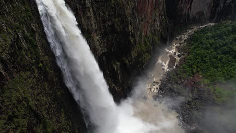 aerial view of wallaman falls, girringun national park, tallest waterfall in australia, drone shot